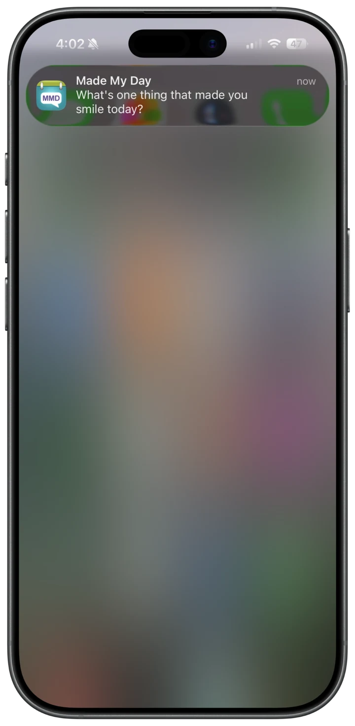 A Made My Day notification on an iPhone: What's one thing that made you smile today?